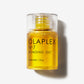 Olaplex Nº.7, huile capillaire Olaplex, bonding oil, protection thermique cheveux, cheveux brillants, soin cheveux abîmés, huile sans silicone, cheveux lissés, cheveux secs, frisottis, cheveux bouclés, Olaplex Maroc, beautyfamily.ma, huile cheveux légère

